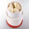 Taglia alimenti manuale Leifheit 03046 — corpo in ABS, piedini antiscivolo, rosso/bianco