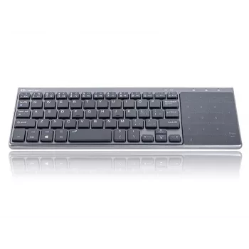 Tracer EXpert RF è una tastiera wireless ergonomica a grandezza naturale con layout QWERTY, tasti a membrana e un design sottile nero-grigio. Progettata per l'uso domestico e in ufficio, combina un touchpad integrato e tasti multimediali con una connessione wireless a 2,4 GHz per offrire una soluzione di input compatta per TV, console, notebook e PC classici.