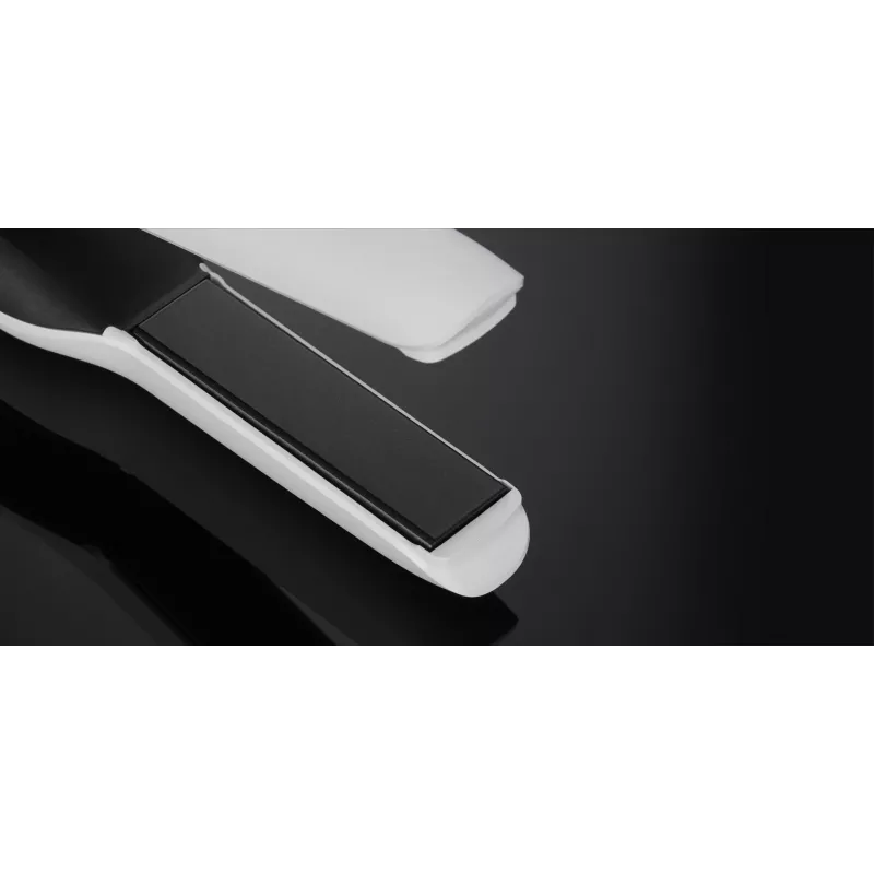 Piastra per capelli GHD Unplugged bianco caldo ioni di litio 300g