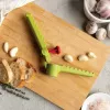 Spremiaglio con manico Ototo Design Garligator verde plastica acciaio