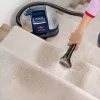 Bissell SpotClean Mini pulitore per tappeti senza fili a mano nero, blu