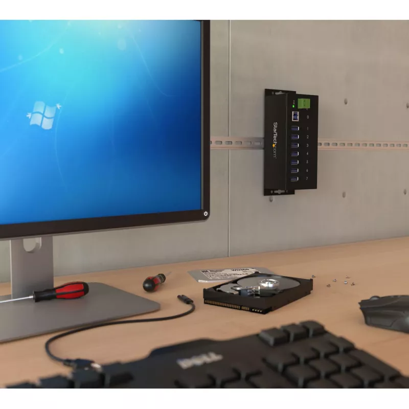 StarTech.com hub USB 3.0 industriale a 7 porte con protezione ESD~hub USB 3.0 a 7 porte (5Gbps) - hub USB-A industriale in metallo con protezione ESD e protezione da sovratensione 350W - montaggio su guida DIN, a parete o su tavolo - hub expander USB conforme TAA