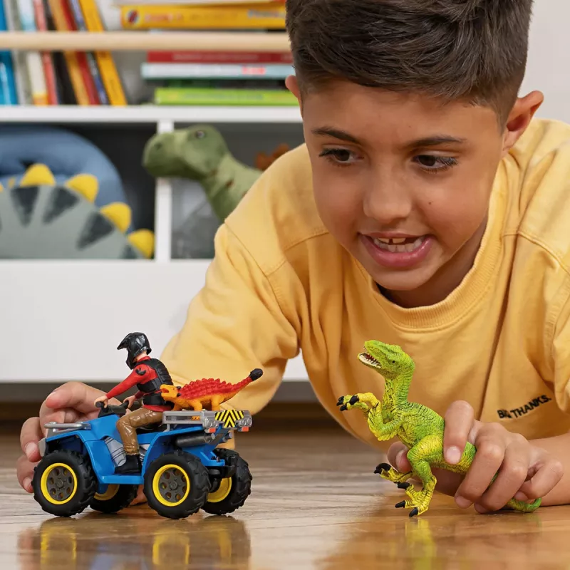 set di gioco Schleich Dinosaurs quad in fuga dal Velociraptor