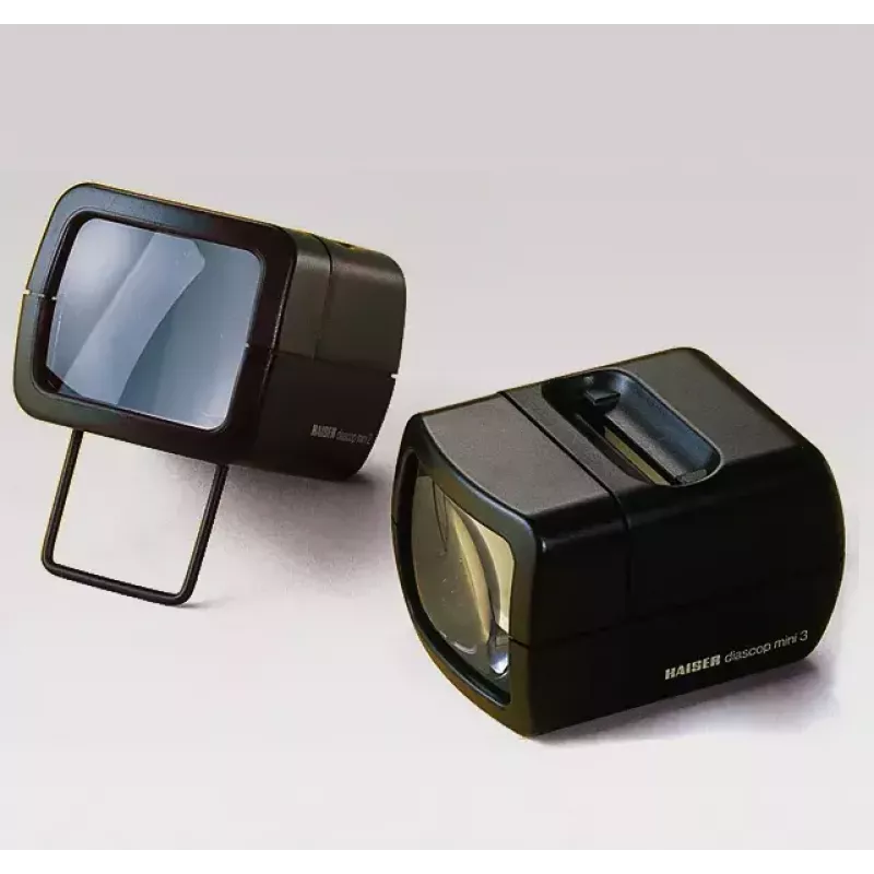 Proiettore per diapositive KAISER 2010 — compatto ingrandimento 3x, 75×105×60 mm, batteria 1,5 V