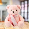 LEAN TOYS Peluche mascotte peluche orsetto con sciarpa rosa 35 cm