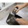 Joseph Joseph Palm Scrub Grey spazzola lavapiatti con dispenser di detersivo integrato