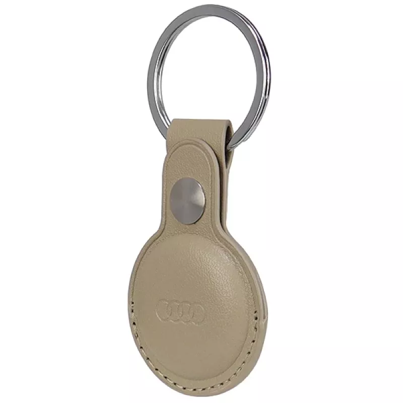 Audi custodia in pelle sintetica AirTag beige AU-ATKR-Q3/D1-BG