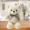 LEAN TOYS Peluche mascotte orsetto con fiocco Happy Every Day bianco 55cm
