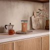 WoodWick Radiant Amber candela, media