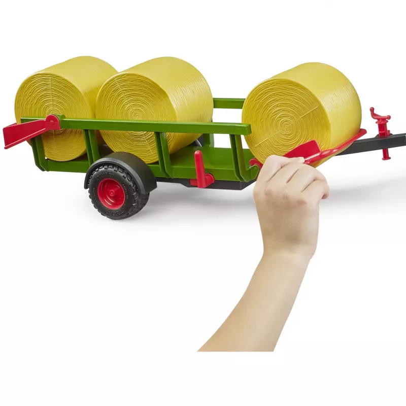 BRUDER raccoglitore di rotoballe con 3 rotoballe