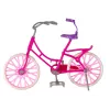 LEAN TOYS Bambola su bicicletta rosa